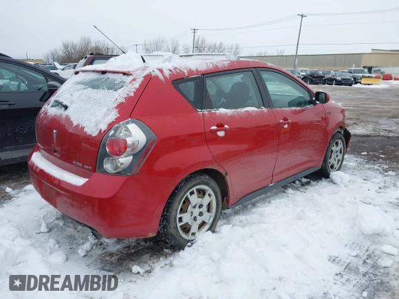 2009 Pontiac Vibe with VIN 5Y2SM67059Z411893, listed as a IAAI auction lot 41446097 with 94,159 mi miles. Bid and sale history available at carsss.com. Image 4.