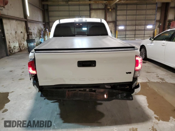 2023 Toyota Tacoma SR z VIN 3TMCZ5AN0PM651386, wystawiony jako Copart lot #51158185 z przebiegiem 23 642 mil mil oraz Szkoda całkowita • Salvage title. Historia ofert i sprzedaży dostępna na DreamBid. Obrazek 6.