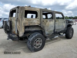 2006 Hummer H3 with VIN 5GTDN136568297746, listed as a Copart auction lot 74004254 with Not Provided miles and Non Repairable. Bid and sale history available at DreamBid. Image 3.