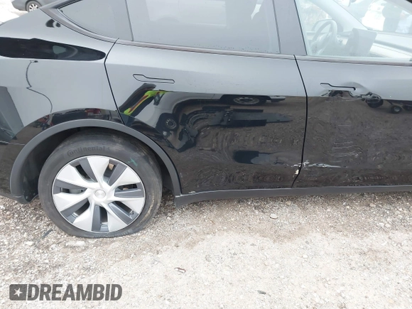 2023 Tesla Model Y Long Range z VIN 7SAYGDEEXPA181114, wystawiony jako IAAI lot #41564617 z przebiegiem 64 990 mil mil oraz . Historia ofert i sprzedaży dostępna na DreamBid. Obrazek 6.
