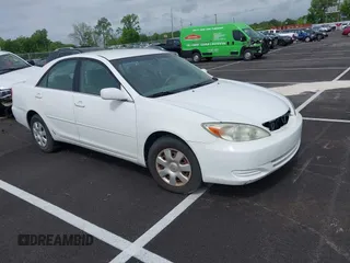 2004 Toyota Camry LE with VIN 4T1BE32K64U277496, listed as a IAAI auction lot 42130199 with 250,972 mi miles. Bid and sale history available at carsss.com. Image 1.