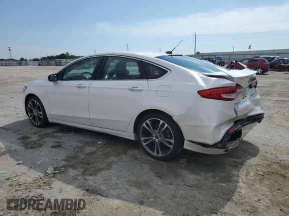 2017 Ford Fusion Titanium с VIN 3FA6P0K96HR161679, выставлен на аукционе Copart как лот 61237935 с пробегом 66 680 миль миль и Списание • Salvage title. История ставок и продаж доступна на DreamBid. Изображение 2.