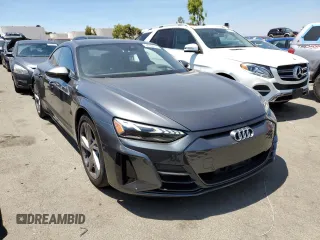 2022 Audi e-tron GT Prestige z VIN WAUDJBFW9N7004503, wystawiony jako Copart lot #57742104 z przebiegiem 27 457 mil mil oraz Szkody całkowita. Historia ofert i sprzedaży dostępna na DreamBid. Obrazek 4.