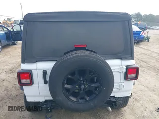 2021 Jeep Wrangler Unlimited Sport S z VIN 1C4HJXDN1MW822016, wystawiony jako IAAI lot #41792808 z przebiegiem 29 719 mil mil oraz . Historia ofert i sprzedaży dostępna na DreamBid. Obrazek 6.