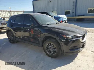 2019 Mazda CX-5 Touring with VIN JM3KFACM7K0659960, listed as a Copart auction lot 49378615 with 72,039 mi miles and Salvage Title. Bid and sale history available at carsss.com. Image 4.