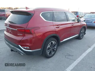 2019 Hyundai Santa Fe Ultimate with VIN 5NMS5CAA4KH105145, listed as a IAAI auction lot 41156214 with 54,796 mi miles and . Bid and sale history available at DreamBid. Image 4.
