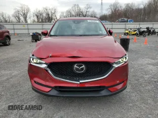 2021 Mazda CX-5 Grand Touring Reserve with VIN JM3KFBAY3M0315640, listed as a Copart auction lot 51004955 with 21,981 mi miles and Salvage Title. Bid and sale history available at DreamBid. Image 5.