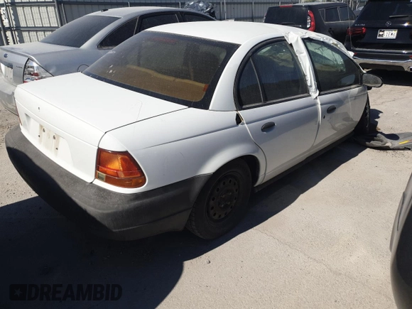 1998 Saturn SL with VIN 1G8ZH5281WZ186209, listed as a Copart auction lot 54977735 with Not provided miles and Non repairable. Bid and sale history available at DreamBid. Image 3.