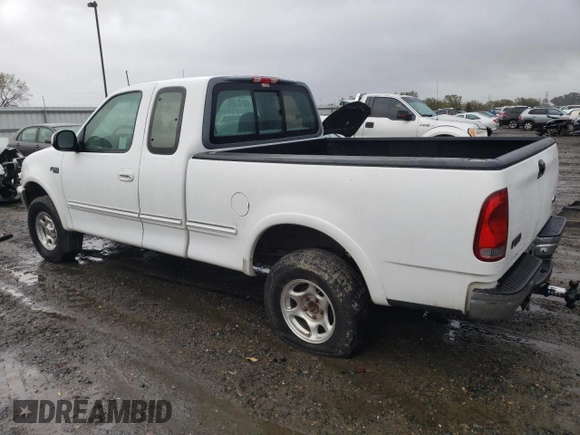 1997 Ford F-150 with VIN 2FTEX18L6VCA28603, listed as a Copart auction lot 49100835 with 127,510 mi miles and Salvage title. Bid and sale history available at DreamBid. Image 2.