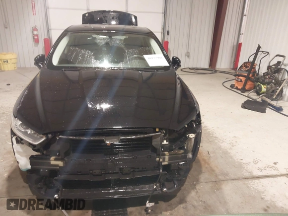 2016 Ford Fusion Titanium with VIN 3FA6P0K96GR197709, listed as a IAAI auction lot 40977902 with 135,259 mi miles. Bid and sale history available at carsss.com. Image 13.