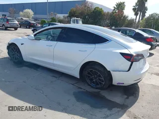 2018 Tesla Model 3 Long Range Battery with VIN 5YJ3E1EB7JF108519, listed as a IAAI auction lot 41835266 with 120,662 mi miles and . Bid and sale history available at DreamBid. Image 3.