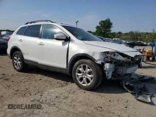 2015 Mazda CX-9 Touring z VIN JM3TB2CA7F0467259, wystawiony jako Copart lot #55646055 z przebiegiem Nie podano mil oraz Czysty tytuł • Clean title. Historia ofert i sprzedaży dostępna na DreamBid. Obrazek 4.