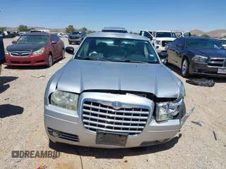 2007 Chrysler 300 with VIN 2C3KA43RX7H664582, listed as a IAAI auction lot 42106297 with 141,866 mi miles and . Bid and sale history available at DreamBid. Image 12.