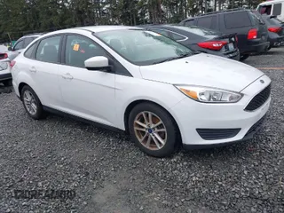 2018 Ford Focus SE with VIN 1FADP3F28JL288105, listed as a IAAI auction lot 41884469 with 1 mi miles. Bid and sale history available at carsss.com. Image 1.