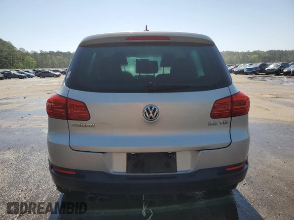 2012 Volkswagen Tiguan SE z VIN WVGAV7AX6CW543053, wystawiony jako Copart lot #53160825 z przebiegiem 167 185 mil mil oraz Szkody całkowita. Historia ofert i sprzedaży dostępna na DreamBid. Obrazek 6.