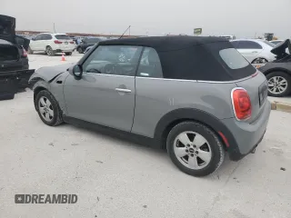 2019 MINI Convertible Cooper z VIN WMWWG5C51K3F79995, wystawiony jako Copart lot #48365685 z przebiegiem 74 357 mil mil oraz Szkoda całkowita • Salvage title. Historia ofert i sprzedaży dostępna na DreamBid. Obrazek 2.