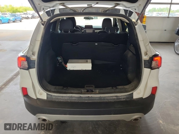 2020 Ford Escape SE with VIN 1FMCU9G63LUB82205, listed as a IAAI auction lot 42663574 with 91,305 mi miles and . Bid and sale history available at DreamBid. Image 8.