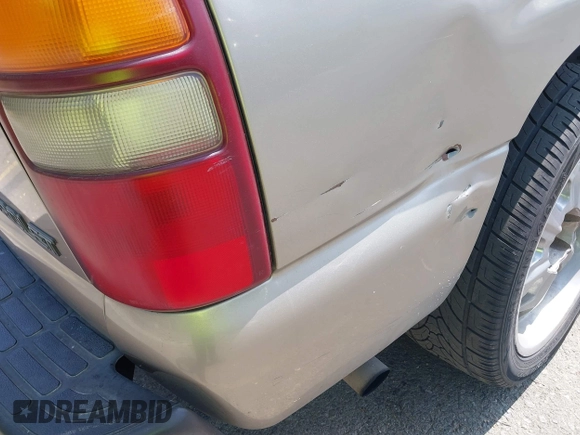 2002 Chevrolet Tahoe LS with VIN 1GNEC13Z22R173568, listed as a IAAI auction lot 42477491 with 277,090 mi miles and . Bid and sale history available at DreamBid. Image 19.