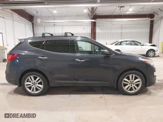 2016 Hyundai Santa Fe Sport with VIN 5XYZWDLA2GG325027, listed as a IAAI auction lot 41958818 with 244,306 mi miles. Bid and sale history available at carsss.com. Image 13.