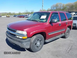 2005 Chevrolet Tahoe LS with VIN 1GNEK13T55J205379, listed as a IAAI auction lot 42143024 with 151,132 mi miles. Bid and sale history available at carsss.com. Image 2.