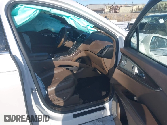 2016 Lincoln MKX Reserve with VIN 2LMTJ8LP3GBL38650, listed as a IAAI auction lot 41338134 with 128,078 mi miles. Bid and sale history available at carsss.com. Image 5.