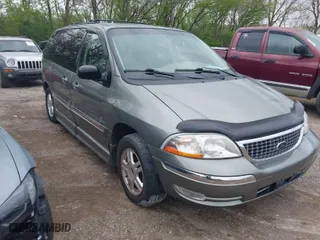 2003 Ford Windstar Wagon SE with VIN 2FMZA52483BB91134, listed as a IAAI auction lot 42094741 with 56,371 mi miles. Bid and sale history available at carsss.com. Image 1.