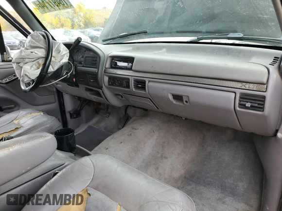 1994 Ford Bronco Custom with VIN 1FMEU15H7RLA79348, listed as a Copart auction lot 76497714 with 204,875 mi miles and Salvage Title. Bid and sale history available at DreamBid. Image 8.