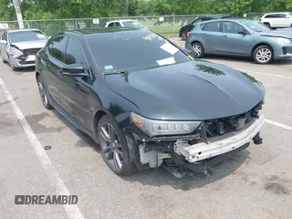 2018 Acura TLX w/A-SPEC Pkg with VIN 19UUB2F60JA003903, listed as a IAAI auction lot 42478311 with 126,094 mi miles and . Bid and sale history available at DreamBid. Image 1.