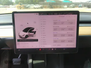 2022 Tesla Model Y Long Range z VIN 7SAYGDEE3NF385933, wystawiony jako IAAI lot #42059675 z przebiegiem 88 488 mil mil oraz . Historia ofert i sprzedaży dostępna na DreamBid. Obrazek 17.