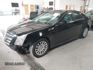 2011 Cadillac CTS Luxury with VIN 1G6DG5EYXB0145058, listed as a IAAI auction lot 41973156 with 143,246 mi miles and . Bid and sale history available at carsss.com. Image 2.