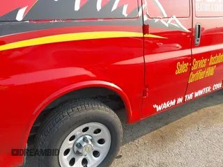 2014 Chevrolet Express Cargo with VIN 1GCSGAFX3E1156517, listed as a IAAI auction lot 42407242 with 154,000 mi miles and . Bid and sale history available at DreamBid. Image 18.