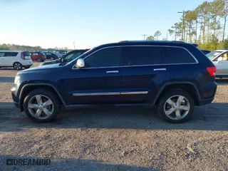 2012 Jeep Grand Cherokee Limited with VIN 1C4RJFBG4CC189210, listed as a IAAI auction lot 41837118 with 155,050 mi miles. Bid and sale history available at carsss.com. Image 14.