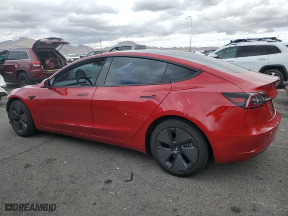 2021 Tesla Model 3 Standard Range Plus with VIN 5YJ3E1EA8MF978257, listed as a Copart auction lot 48592605 with 84,710 mi miles and Salvage Title. Bid and sale history available at carsss.com. Image 2.