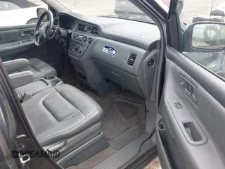 2004 Honda Odyssey EX-L with VIN 5FNRL18064B066763, listed as a IAAI auction lot 42588622 with 499,993 mi miles and . Bid and sale history available at DreamBid. Image 5.