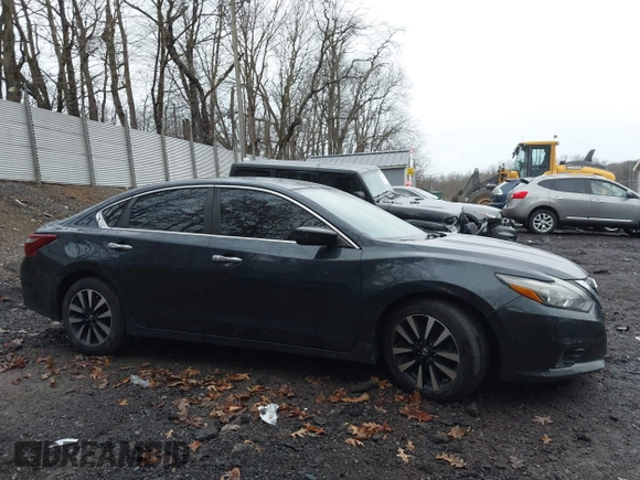 2018 Nissan Altima SV with VIN 1N4AL3AP3JC205875, listed as a IAAI auction lot 41892855 with 159,630 mi miles and . Bid and sale history available at DreamBid. Image 14.