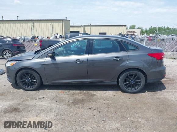 2017 Ford Focus SE with VIN 1FADP3F2XHL235013, listed as a IAAI auction lot 42370565 with 112,276 mi miles and . Bid and sale history available at DreamBid. Image 14.
