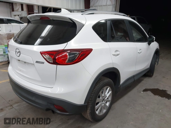2016 Mazda CX-5 Sport with VIN JM3KE2BY8G0787130, listed as a IAAI auction lot 41847443 with 96,611 mi miles. Bid and sale history available at carsss.com. Image 4.