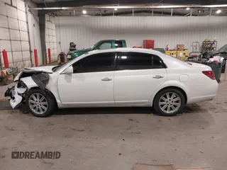 2010 Toyota Avalon XL with VIN 4T1BK3DB9AU358803, listed as a IAAI auction lot 41072257 with 157,185 mi miles and . Bid and sale history available at DreamBid. Image 14.
