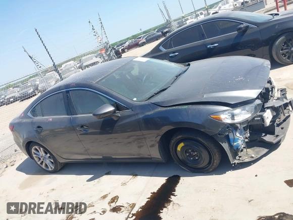 2014 Mazda 6 i Touring with VIN JM1GJ1V55E1105379, listed as a IAAI auction lot 42010585 with 153,870 mi miles and . Bid and sale history available at DreamBid. Image 14.