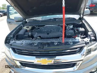 2018 Chevrolet Colorado 4WD Z71 with VIN 1GCGTDENXJ1247717, listed as a IAAI auction lot 42557264 with 91,463 mi miles and . Bid and sale history available at DreamBid. Image 10.
