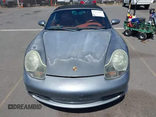 2003 Porsche Boxster с VIN WP0CA29893U621152, выставлен на аукционе IAAI как лот 42533307 с пробегом Не указан миль и . История ставок и продаж доступна на DreamBid. Изображение 6.