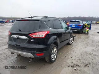 2013 Ford Escape SEL with VIN 1FMCU9H90DUA77972, listed as a IAAI auction lot 41984889 with 206,265 mi miles. Bid and sale history available at carsss.com. Image 4.