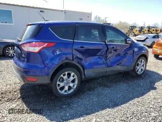 2013 Ford Escape SEL with VIN 1FMCU9HX7DUA78826, listed as a Copart auction lot 53275325 with 128,650 mi miles and Salvage title. Bid and sale history available at DreamBid. Image 3.