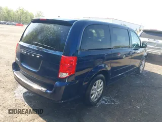 2016 Dodge Grand Caravan SE with VIN 2C4RDGBG2GR146897, listed as a IAAI auction lot 42076396 with 180,603 mi miles and . Bid and sale history available at DreamBid. Image 4.