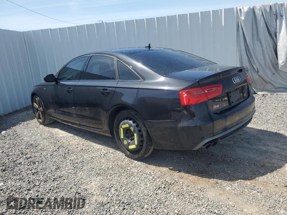 2014 Audi S6 Prestige z VIN WAUF2AFC9EN133262, wystawiony jako Copart lot #48524255 z przebiegiem 120 103 mil mil oraz Tytuł czysty. Historia ofert i sprzedaży dostępna na DreamBid. Obrazek 2.