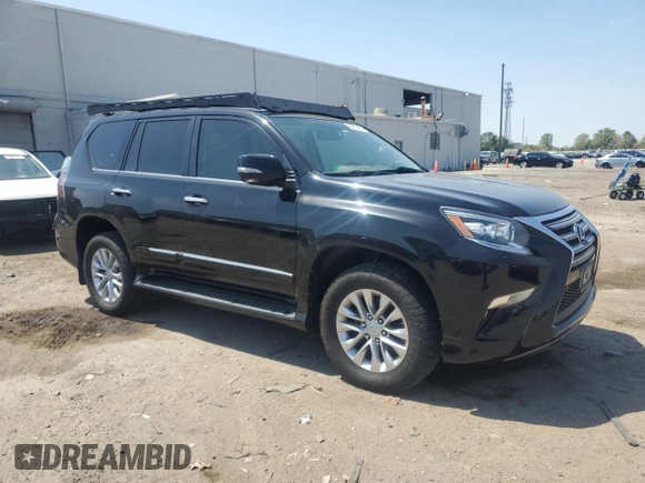 2014 Lexus GX with VIN JTJBM7FXXE5086922, listed as a Copart auction lot 53870665 with 142,608 mi miles and Salvage Title. Bid and sale history available at carsss.com. Image 4.