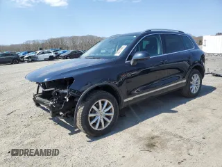 2015 Volkswagen Touareg Sport with VIN WVGEF9BP3FD001496, listed as a Copart auction lot 53517495 with 110,738 mi miles and Clean title. Bid and sale history available at DreamBid. Image 1.
