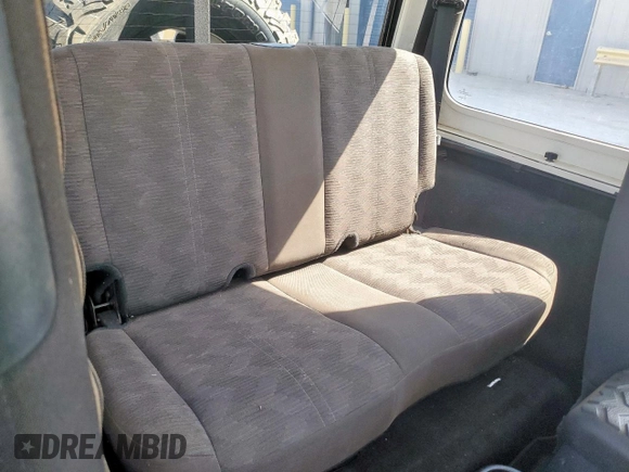 2004 Jeep Wrangler Rubicon z VIN 1J4FA69S34P757352, wystawiony jako Copart lot #52971745 z przebiegiem 139 855 mil mil oraz Szkoda całkowita • Salvage title. Historia ofert i sprzedaży dostępna na DreamBid. Obrazek 11.