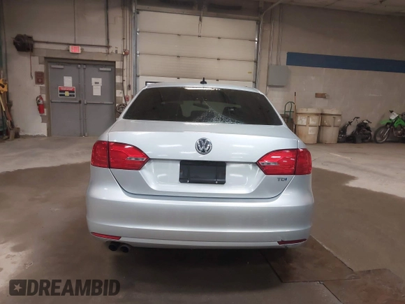 2014 Volkswagen Jetta TDI w/Premium with VIN 3VW3L7AJ6EM379401, listed as a IAAI auction lot 42086326 with 89,870 mi miles and . Bid and sale history available at DreamBid. Image 16.