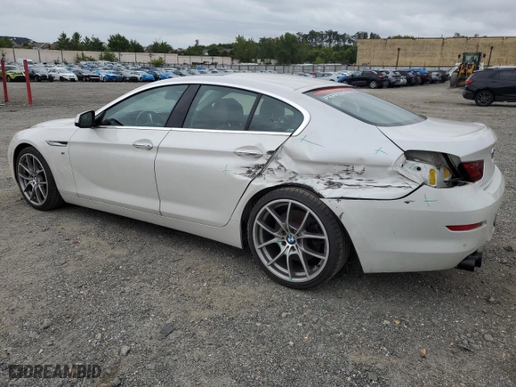 2015 BMW 6 Series 650i with VIN WBA6B2C57FGB99135, listed as a Copart auction lot 72610904 with 99,137 mi miles and Salvage Title. Bid and sale history available at carsss.com. Image 2.